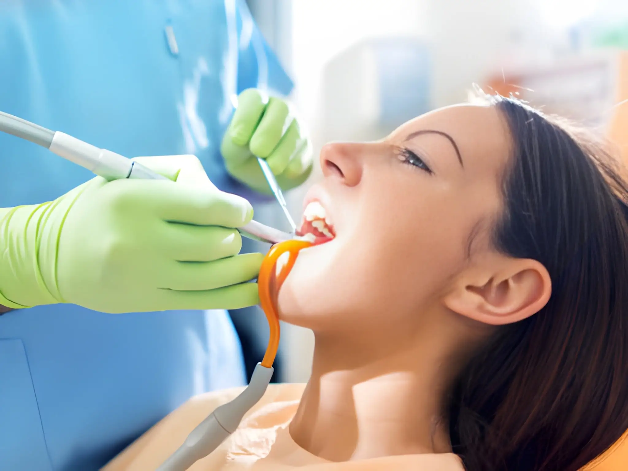 Teeth cleaning in Flower Mound TX patient receiving professional cleaning at Supreme Smiles.
